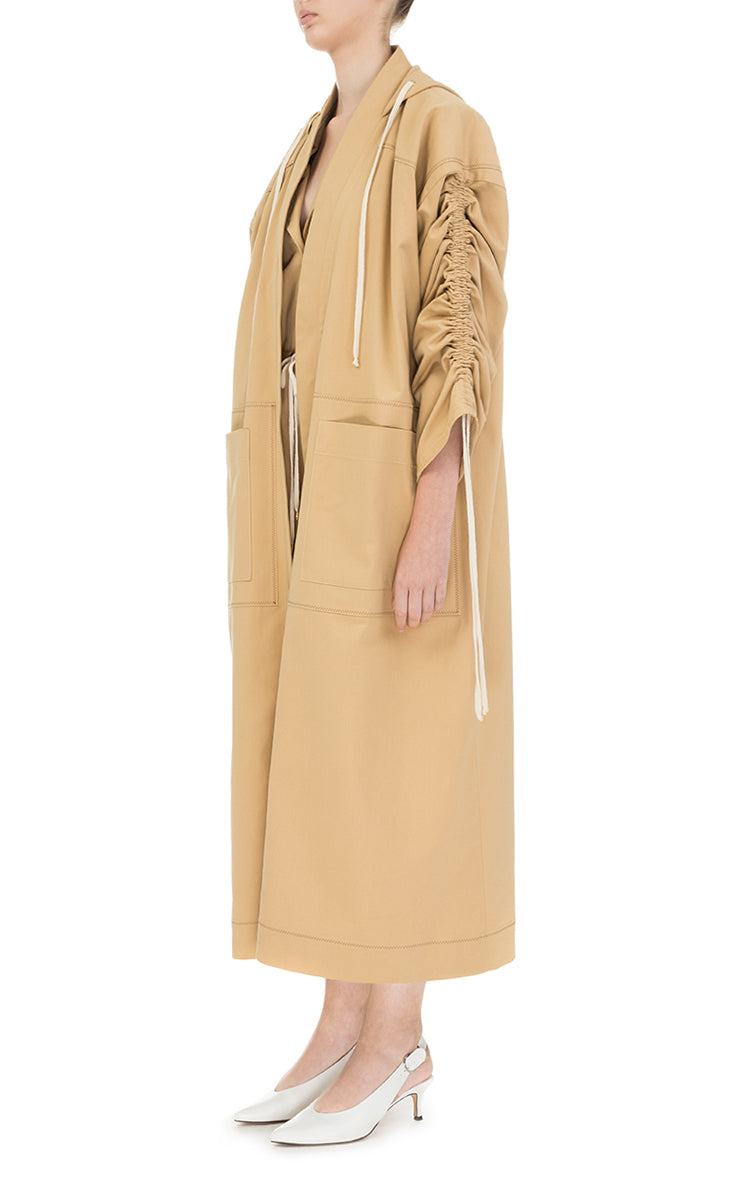 Cotton trench coat with strings